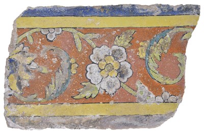 Lot 220 - â€¡A MUGHAL CUERDA SECA FRAGMENTARY BORDER TILE