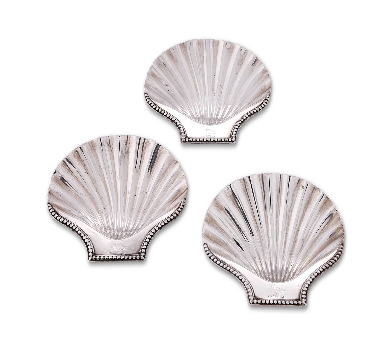 Lot 228 - A SET OF THREE GEORGE III SILVER SHELL DISHES, ANDREW FOGELBERG, LONDON, CIRCA 1770