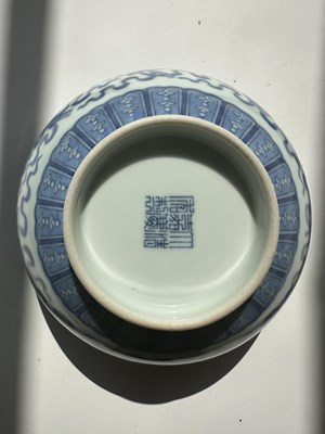 Lot 14 - A CHINESE BLUE AND WHITE 'EIGHT DOAIST EMBLEMS' BOWL, JIAQING MARK AND PERIOD (1796-1820)