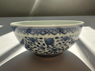 Lot 14 - A CHINESE BLUE AND WHITE 'EIGHT DOAIST EMBLEMS' BOWL, JIAQING MARK AND PERIOD (1796-1820)
