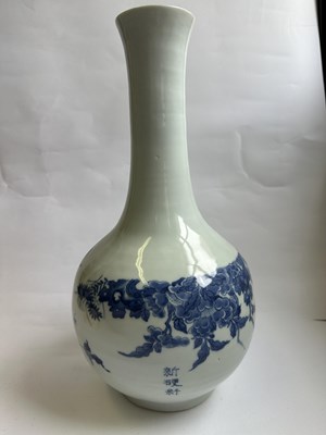 Lot 15 - A CHINESE BLUE AND WHITE BOTTLE VASE