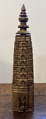 Lot 140 - A PALA GILT WOOD MODEL OF THE MAHABODHI SHRINE, BODH GAYA, INDIA, CIRCA 11TH CENTURY