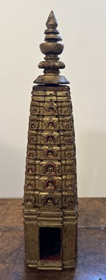 Lot 140 - A PALA GILT WOOD MODEL OF THE MAHABODHI SHRINE, BODH GAYA, INDIA, CIRCA 11TH CENTURY