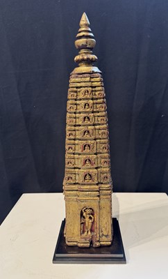 Lot 140 - A PALA GILT WOOD MODEL OF THE MAHABODHI SHRINE, BODH GAYA, INDIA, CIRCA 11TH CENTURY