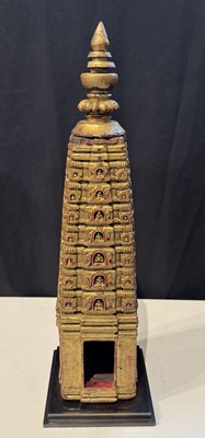 Lot 140 - A PALA GILT WOOD MODEL OF THE MAHABODHI SHRINE, BODH GAYA, INDIA, CIRCA 11TH CENTURY