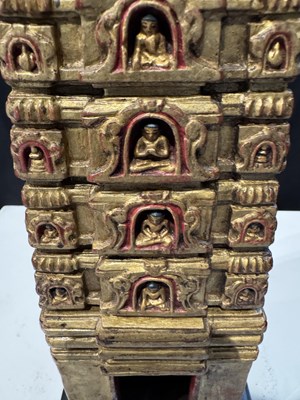 Lot 140 - A PALA GILT WOOD MODEL OF THE MAHABODHI SHRINE, BODH GAYA, INDIA, CIRCA 11TH CENTURY