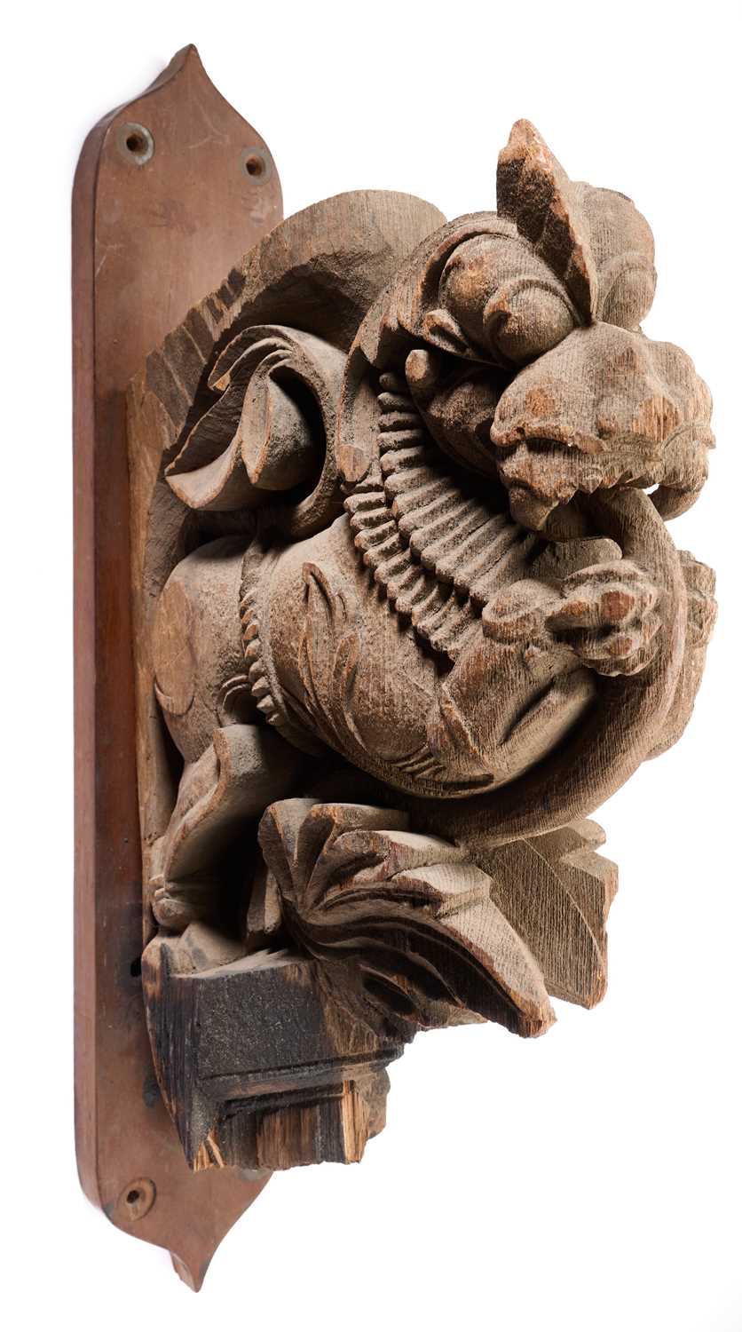 Lot 71 - AN ARCHITECTURAL BRACKET IN THE FORM OF A MYTHICAL LION, SOUTH INDIA, 19TH CENTURY