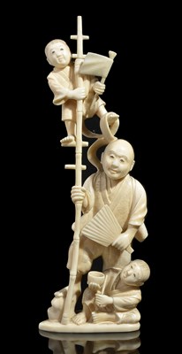 Lot 266 - ~A JAPANESE IVORY OKIMONO OF A MAN AND BOYS WITH BAMBOO LADDER