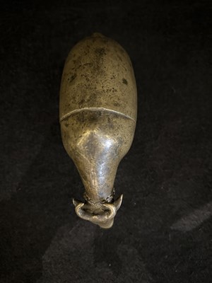 Lot 191 - A BRONZE RITUAL SPRINKLER IN THE FORM OF A COW, INDIA, CIRCA 17TH CENTURY