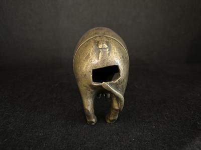 Lot 191 - A BRONZE RITUAL SPRINKLER IN THE FORM OF A COW, INDIA, CIRCA 17TH CENTURY