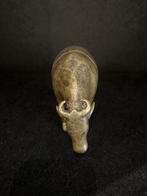 Lot 191 - A BRONZE RITUAL SPRINKLER IN THE FORM OF A COW, INDIA, CIRCA 17TH CENTURY