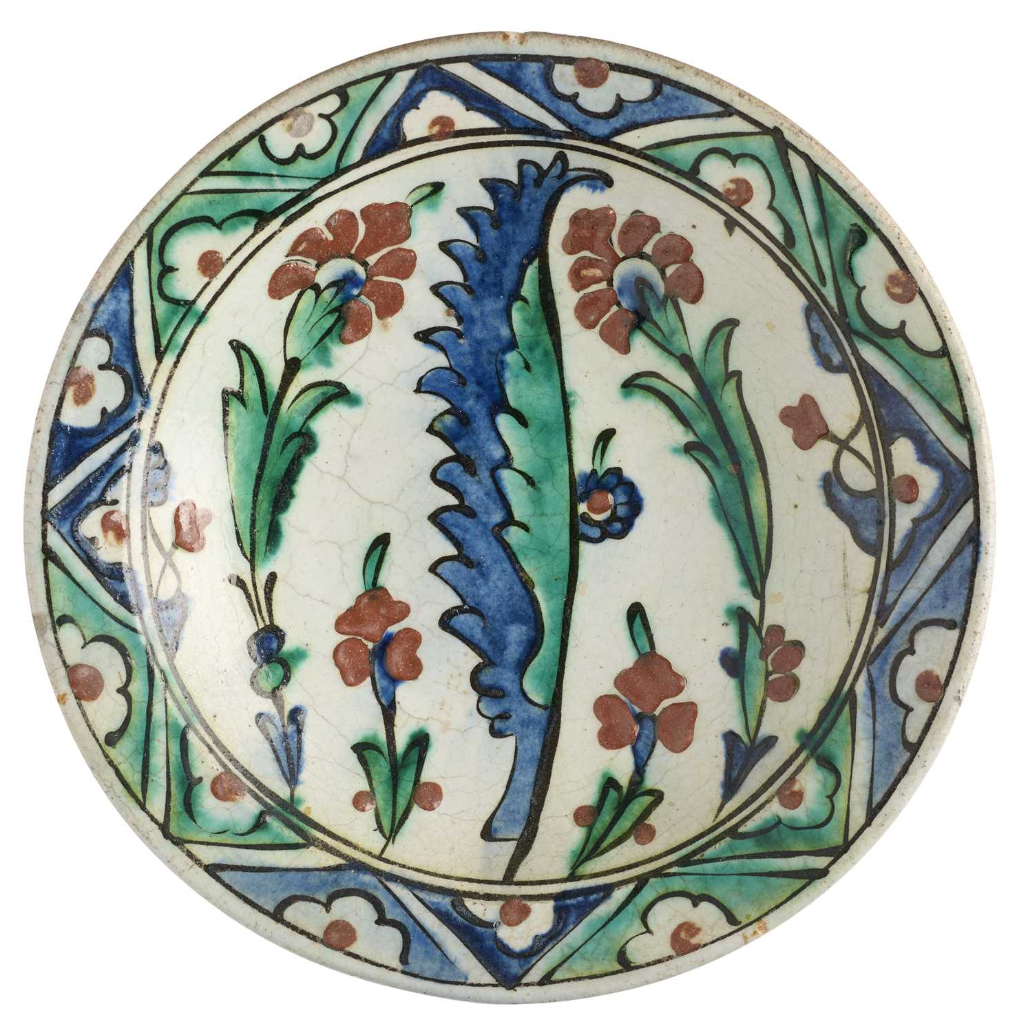 Lot 128 - AN IZNIK DISH, OTTOMAN ANATOLIA, FIRST HALF 17TH CENTURY