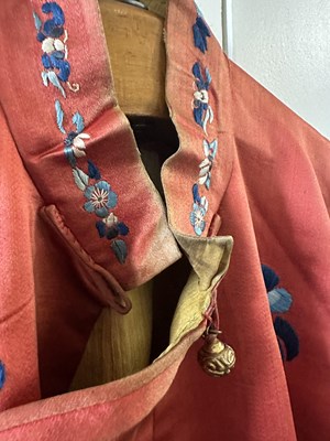 Lot 56 - A CHINESE WOMAN'S SILK EMBROIDERED RED-GROUND ROBE, CHANGYI, QING DYNASTY, LATER 19TH CENTURY