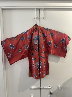 Lot 56 - A CHINESE WOMAN'S SILK EMBROIDERED RED-GROUND ROBE, CHANGYI, QING DYNASTY, LATER 19TH CENTURY