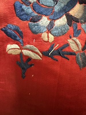 Lot 56 - A CHINESE WOMAN'S SILK EMBROIDERED RED-GROUND ROBE, CHANGYI, QING DYNASTY, LATER 19TH CENTURY