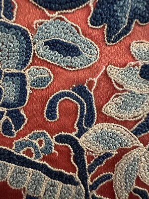 Lot 56 - A CHINESE WOMAN'S SILK EMBROIDERED RED-GROUND ROBE, CHANGYI, QING DYNASTY, LATER 19TH CENTURY