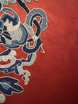 Lot 56 - A CHINESE WOMAN'S SILK EMBROIDERED RED-GROUND ROBE, CHANGYI, QING DYNASTY, LATER 19TH CENTURY
