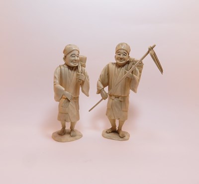 Lot 275 - ~TWO JAPANESE IVORY OKIMONO OF FARMERS