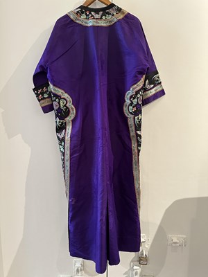 Lot 55 - A CHINESE WOMAN'S SILK EMBROIDERED PURPLE-GROUND ROBE, CHANGYI, QING DYNASTY, LATER 19TH CENTURY