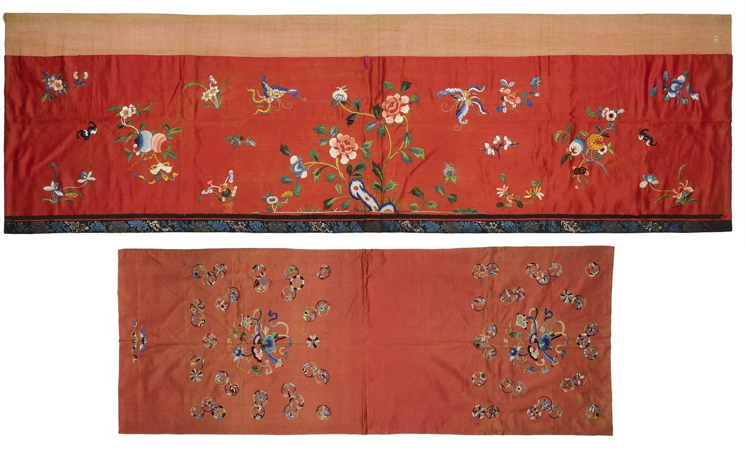 Lot 54 - TWO CHINESE RED GROUND EMBROIDERED SILK CHAIR COVERS, QING DYNASTY, 19TH CENTURY