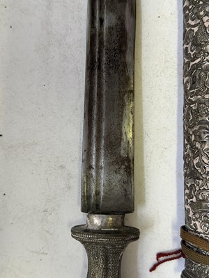 Lot 522 - A BHUTANESE DAGGER, AN INDIAN KARD, A CHINESE CUTLERY SET, A MALAYSIAN SWORD