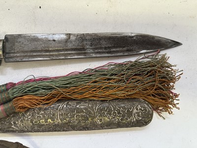 Lot 522 - A BHUTANESE DAGGER, AN INDIAN KARD, A CHINESE CUTLERY SET, A MALAYSIAN SWORD