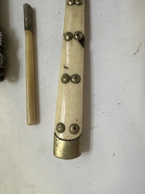 Lot 522 - A BHUTANESE DAGGER, AN INDIAN KARD, A CHINESE CUTLERY SET, A MALAYSIAN SWORD
