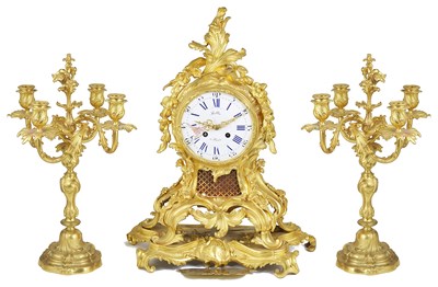 Lot 293 - A MATCHED THREE-PIECE GILT-BRONZE CLOCK GARNITURE