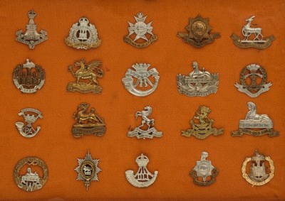 Lot 680 - A COLLECTION OF 20 METAL BRITISH MILITARY CAP BADGES