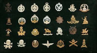 Lot 679 - A COLLECTION OF 28 METAL BRITISH MILITARY CAP BADGES
