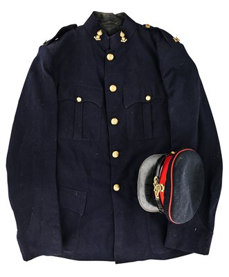 Lot 645 - A GEORGE V PEAKED CAP AND TUNIC OF AN OFFICER OF THE ROYAL ARTILLERY