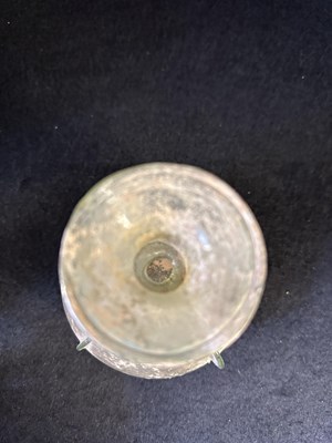 Lot 66 - A ROMAN PALE GREEN GLASS SPRINKLER FLASK, CIRCA 3RD-4TH CENTURY A.D.