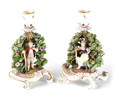 Lot 308 - A PAIR OF MEISSEN FIGURAL SMALL CHAMBERSTICKS