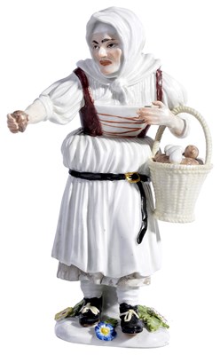 Lot 310 - A MEISSEN FIGURE OF AN EGG-SELLER