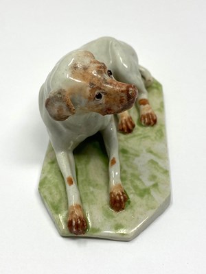 Lot 11 - A LUDWIGSBURG PORCELAIN FIGURE OF A HOUND, CIRCA 1755-65