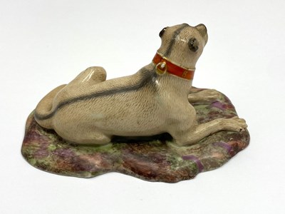 Lot 12 - A FÜRSTENBERG FIGURE OF A HOUND, DATED 1781