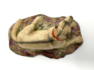 Lot 12 - A FÜRSTENBERG FIGURE OF A HOUND, DATED 1781