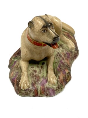Lot 12 - A FÜRSTENBERG FIGURE OF A HOUND, DATED 1781
