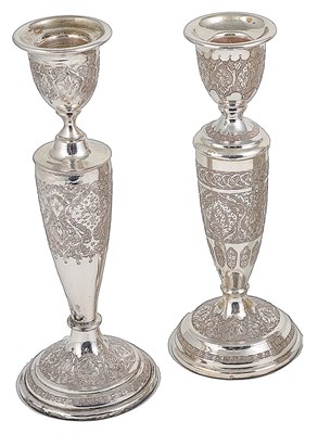 Lot 325 - TWO PERSIAN SILVER CANDLESTICKS