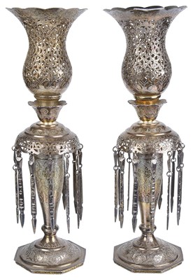 Lot 327 - â€¡A PAIR OF SILVERED CANDLESTICKS