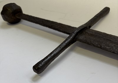 Lot 129 - A MEDIEVAL HAND-AND-A-HALF SWORD, EARLY 14TH CENTURY