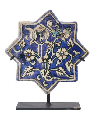 Lot 95 - AN ILKHANID STAR TILE, PERSIA, 14TH CENTURY