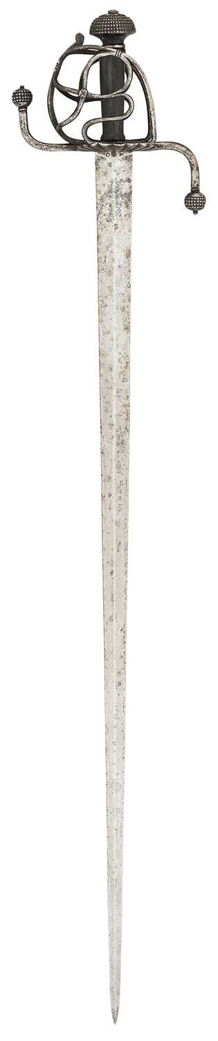 Lot 28 - A NORTH EUROPEAN BASKET-HILTED MILITARY BACKSWORD (TESSAK), LATE 16TH CENTURY