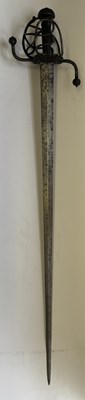 Lot 28 - A NORTH EUROPEAN BASKET-HILTED MILITARY BACKSWORD (TESSAK), LATE 16TH CENTURY
