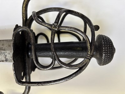 Lot 28 - A NORTH EUROPEAN BASKET-HILTED MILITARY BACKSWORD (TESSAK), LATE 16TH CENTURY