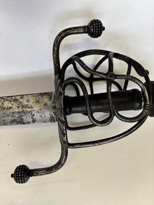Lot 28 - A NORTH EUROPEAN BASKET-HILTED MILITARY BACKSWORD (TESSAK), LATE 16TH CENTURY