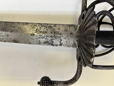 Lot 28 - A NORTH EUROPEAN BASKET-HILTED MILITARY BACKSWORD (TESSAK), LATE 16TH CENTURY
