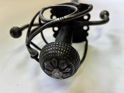 Lot 28 - A NORTH EUROPEAN BASKET-HILTED MILITARY BACKSWORD (TESSAK), LATE 16TH CENTURY