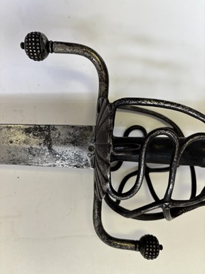 Lot 28 - A NORTH EUROPEAN BASKET-HILTED MILITARY BACKSWORD (TESSAK), LATE 16TH CENTURY