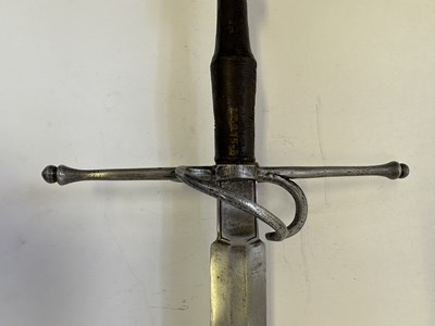 Lot 25 - A HAND-AND-A-HALF SWORD, CIRCA 1600-20, PROBABLY AUSTRIAN